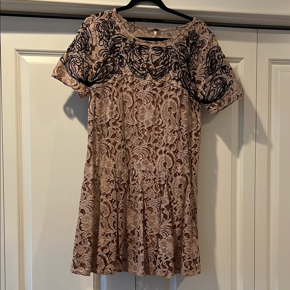 Elegant Lace Dress with Black Accents